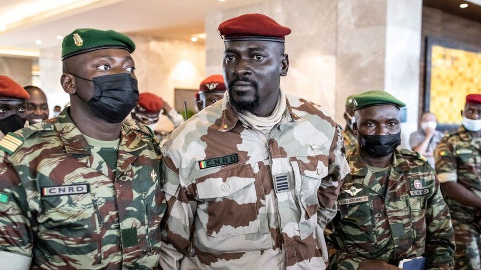 Col Mamady Doumbouya (centre) overthrew the elected government in a coup in September 2021